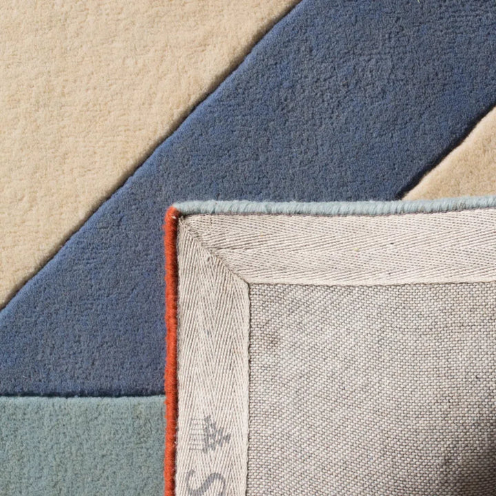 Close up corner detail of Geocraft Modern Abstract hand tufted wool rug showing texture weave and precise geometric pattern.