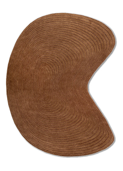 Organic shaped Clay Ripple Wool Rug with modern curved silhouette crafted in hand tufted wool.
