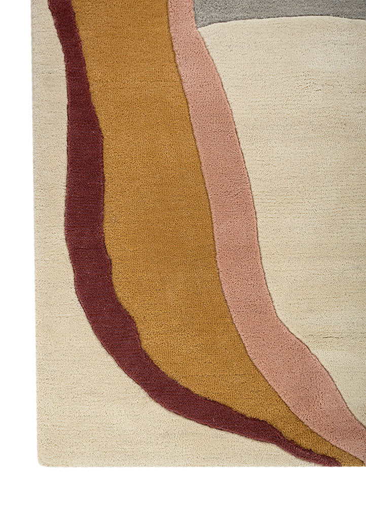 Edge detail of Muse Wool Rug hand tufted abstract wool rug with layered pattern.