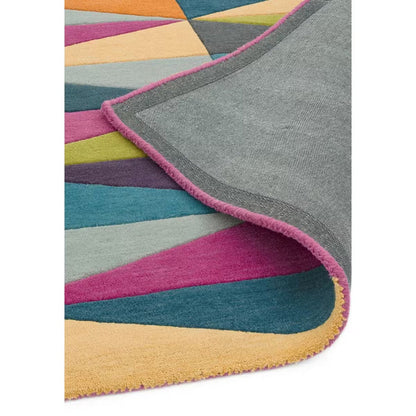 Folded corner detail of Prism Echo Multicolor Geometric hand tufted wool rug displaying thickness edge finish and wool quality