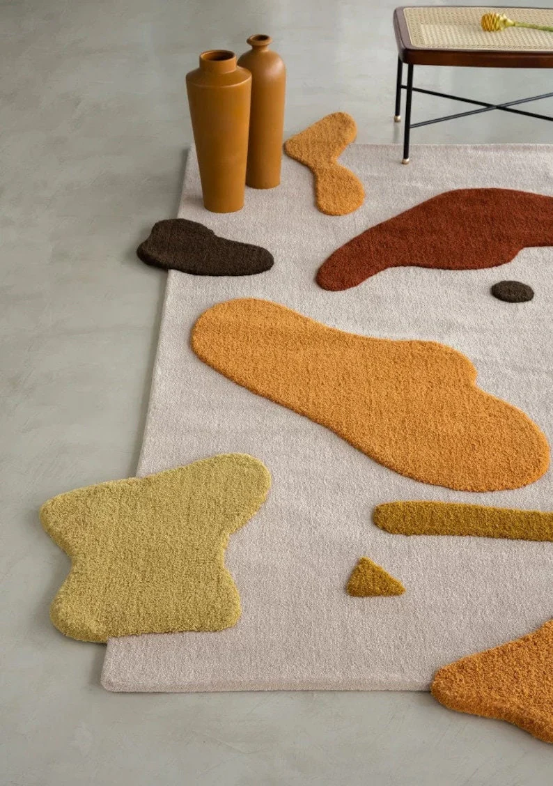 Styled interior view of Terra Bloom Abstract Wool Rug hand tufted wool rug in modern living space.