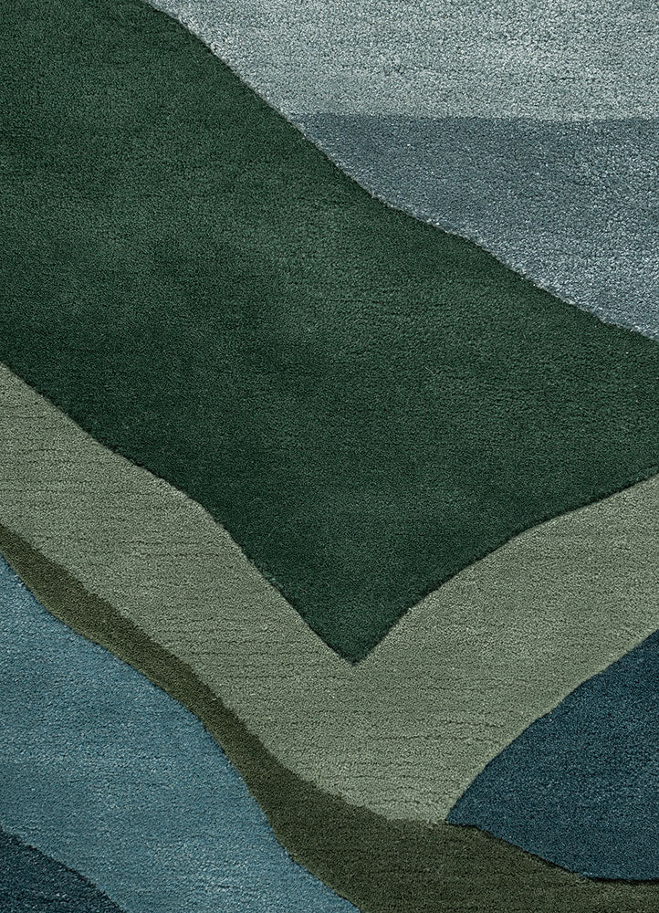 Full rug view of Verdant Ridge hand tufted wool rug showing complete abstract ridge pattern in green blue and grey tones.
