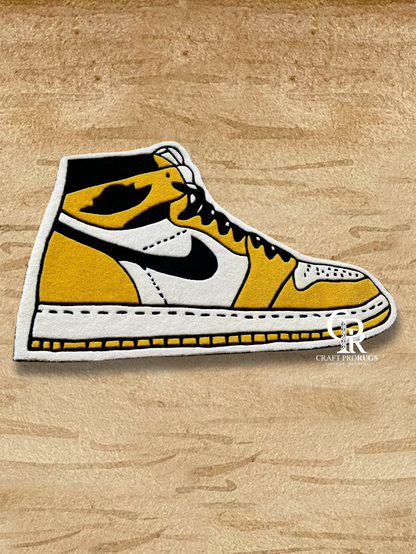 Front view of Air Jordan Yellow Hand-Tufted Rug with striking yellow, black, and white sneaker artwork.