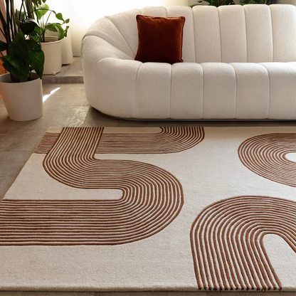 Amity Terra Linear hand tufted wool rug styled in a modern living space with flowing linear curves in warm terra tones.