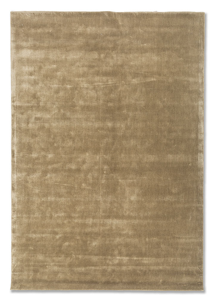Hand-tufted beige wool rug with soft velvet-like texture, elegant minimalist wool design, full view.