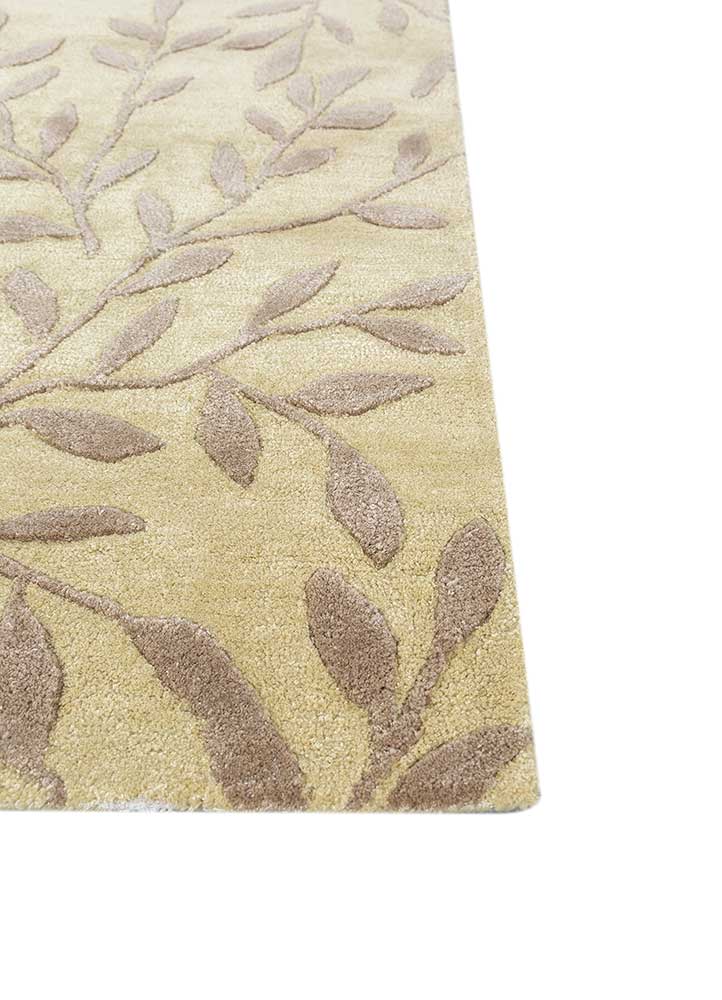 Close detailed texture of Botanical Leaf hand tufted wool rug showing dense wool fibers.