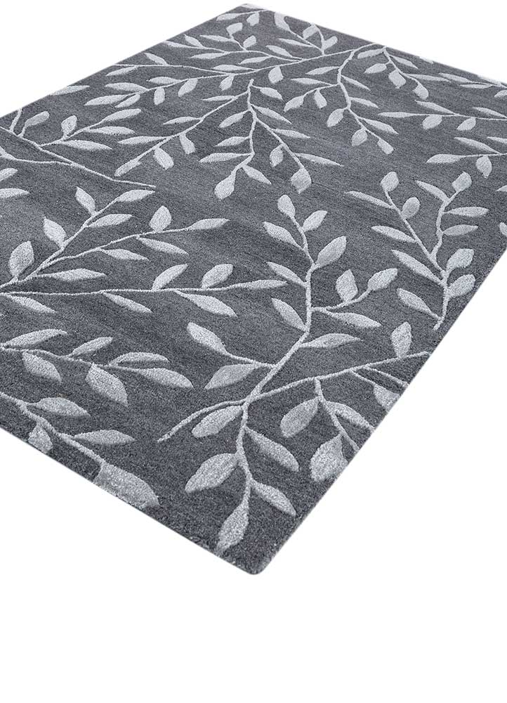 Side upper view of Botanical Vine hand tufted wool rug showing pile height and surface finish