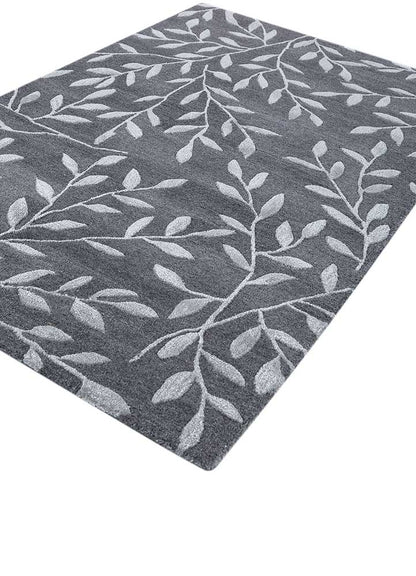 Side upper view of Botanical Vine hand tufted wool rug showing pile height and surface finish