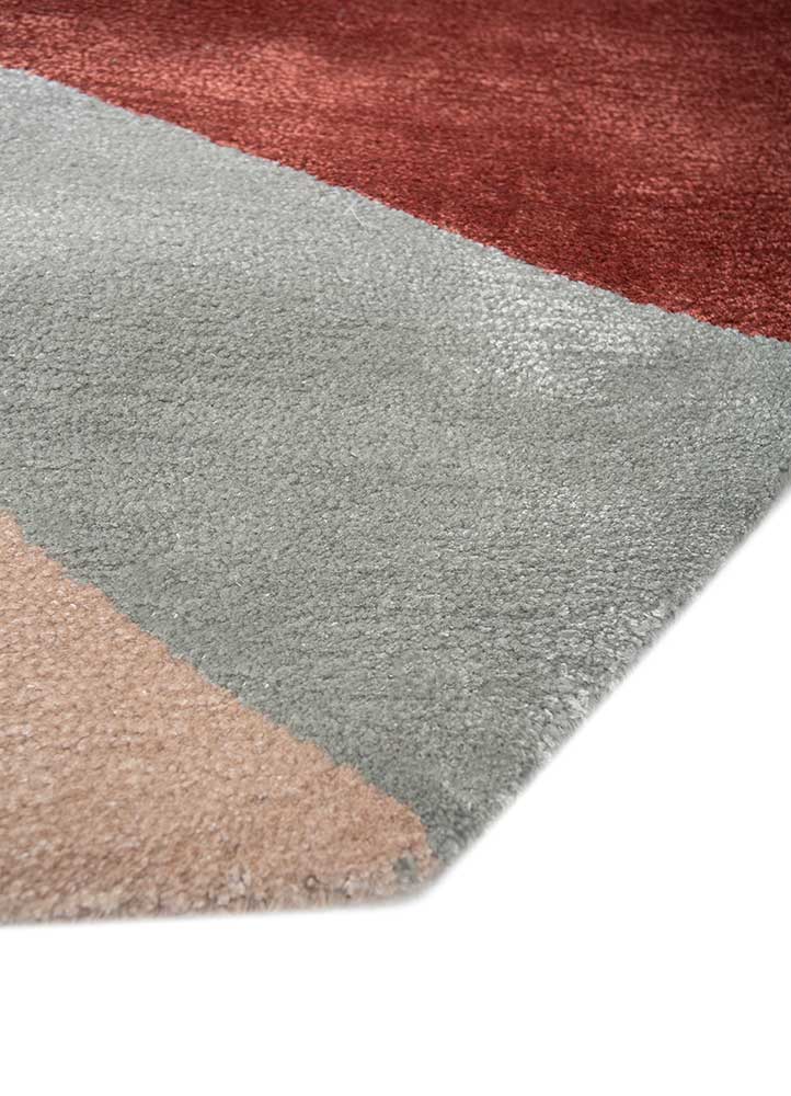 Close-up of Color Axis Wool Rug corner showing detailed geometric design, vibrant colors, and soft wool texture
