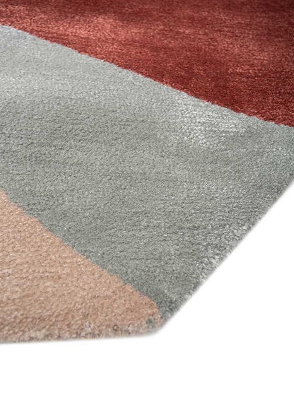 Close-up of Color Axis Wool Rug corner showing detailed geometric design, vibrant colors, and soft wool texture