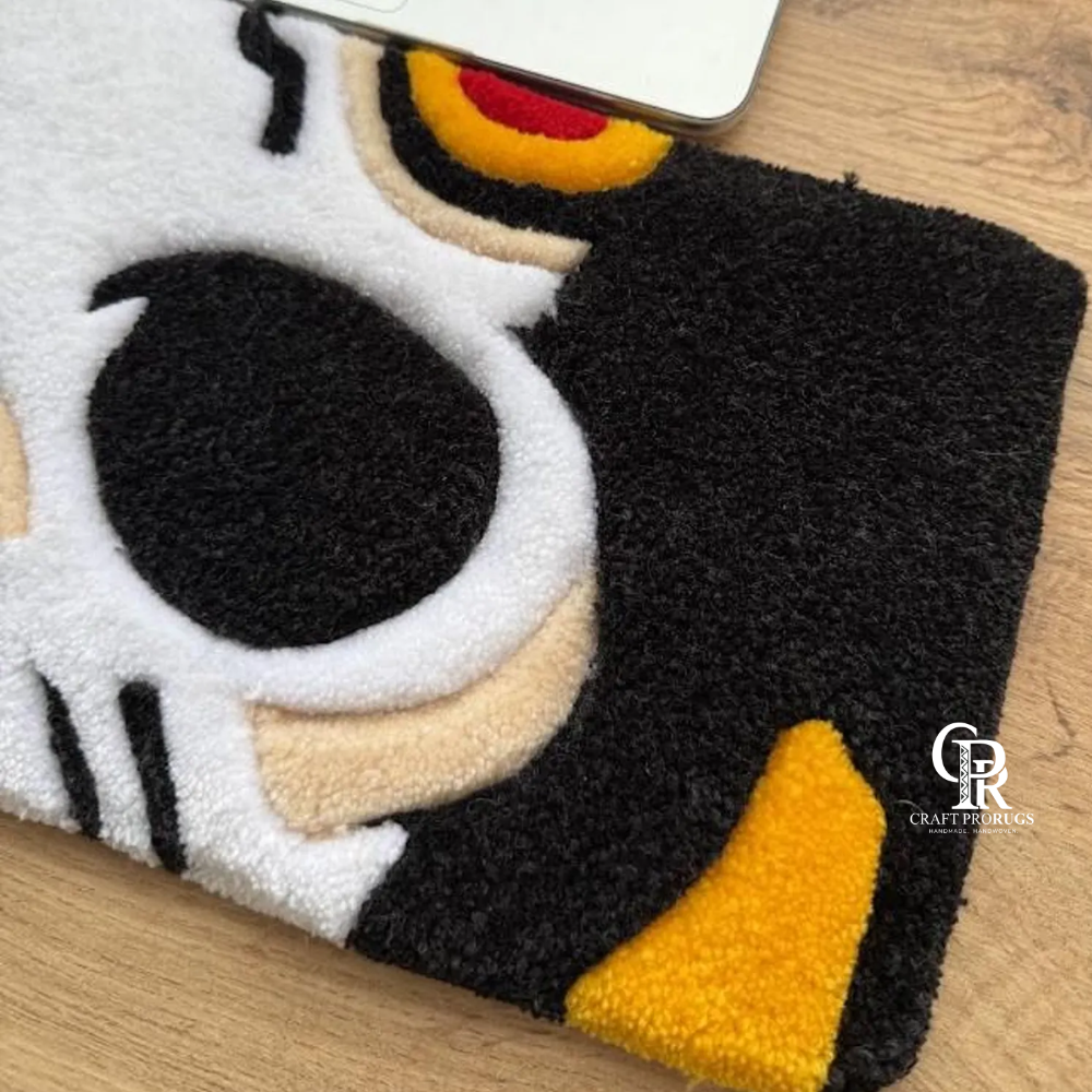 Half-side view of Dark Skull Hand‑Tufted Keyboard Mat on desk showing skull design and plush texture
