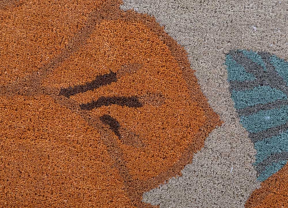 Close-up of floral vine design on Floral Vine hand tufted wool rug.