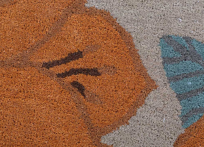 Close-up of floral vine design on Floral Vine hand tufted wool rug.