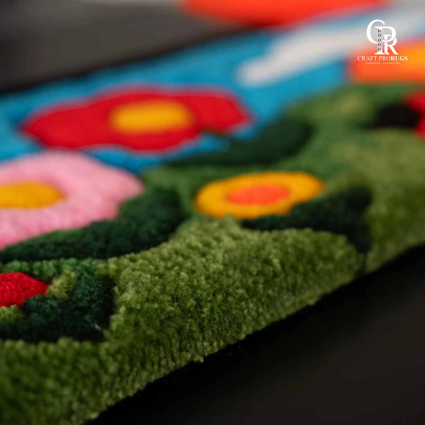 Closest view of Floral Aura Keyboard Rug showing fine handmade tufting vibrant flower details and premium soft yarn texture
