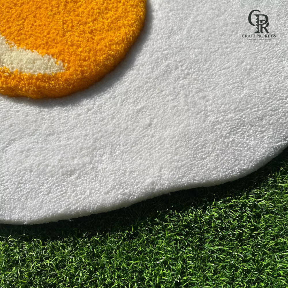 Extreme macro detail of fried egg rug highlighting yolk depth and tufted fiber texture.