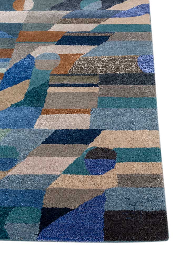 Close-up of hand-tufted Geometric Mosaic wool rug showing soft texture and vibrant multicolor geometric design.