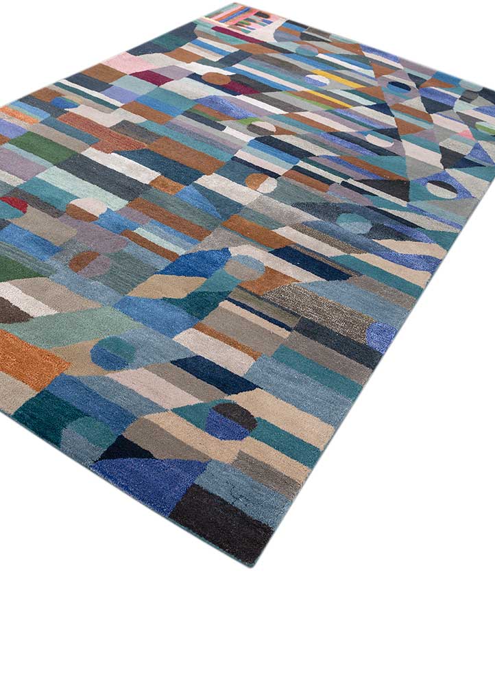 Close-up of hand-tufted Geometric Mosaic wool rug highlighting texture and multicolor design.
