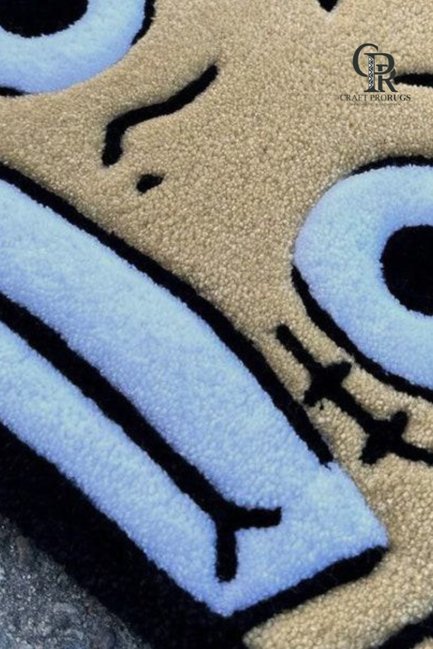 Close shot of hand-tufted Straw Hat Pirate rug showing texture and stitching detail.