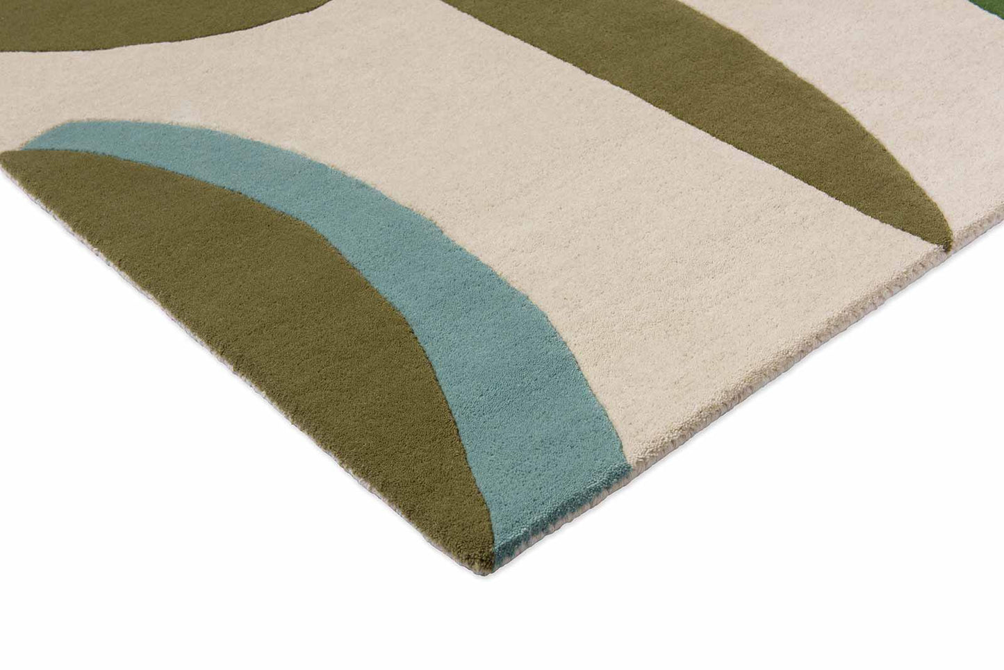 Corner edge detail of Harlequin Torillo hand tufted wool rug showing clean finish and sharp color contrast.