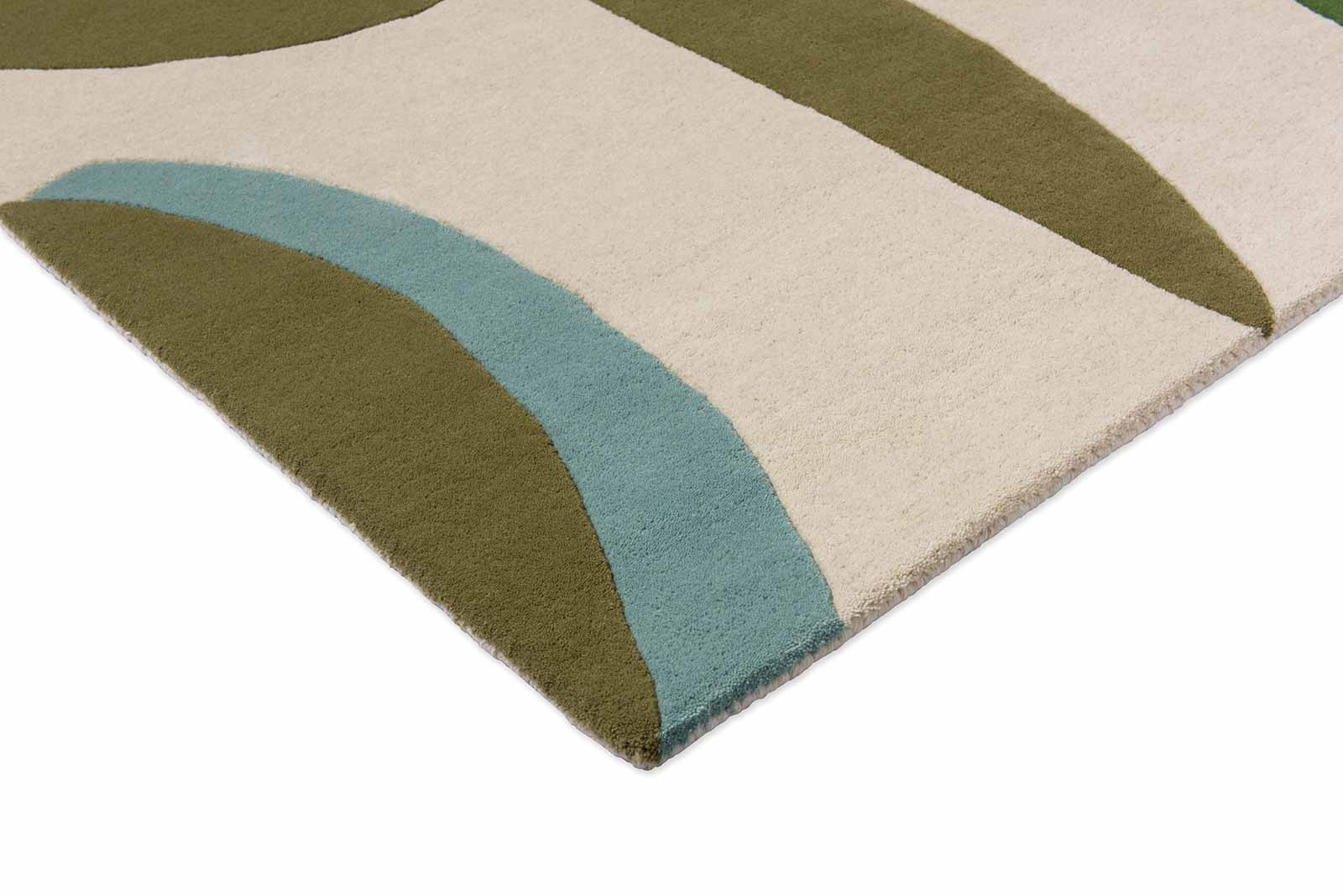 Corner edge detail of Harlequin Torillo hand tufted wool rug showing clean finish and sharp color contrast.