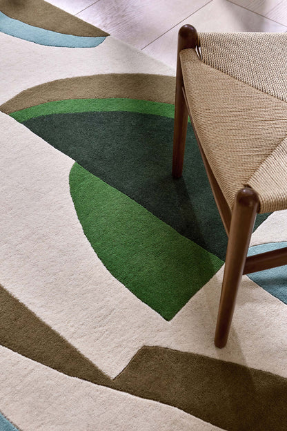 Close up texture view of Harlequin Torillo hand tufted wool rug highlighting dense wool pile and fine weaving detail.