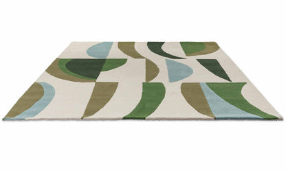 Top angle view of Harlequin Torillo hand tufted wool rug highlighting flowing shapes and smooth wool texture