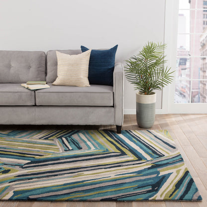 Linear Pattern hand tufted wool rug placed in a modern living room featuring multicolor linear design and textured wool surface
