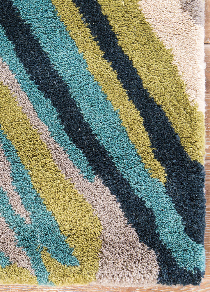 Close view of Linear Pattern hand tufted wool rug highlighting dense wool pile and multicolor linear texture
