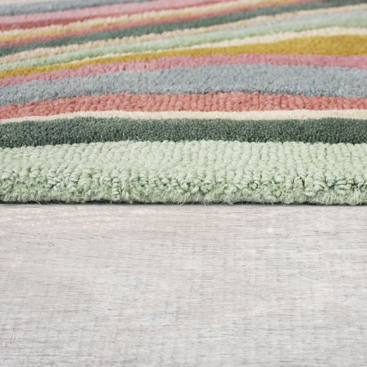 Liora Pastel Wave Rug hand tufted wool rug close-up showing high-quality wool and wave pattern details.