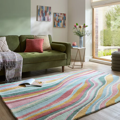 Liora Pastel Wave Rug hand tufted wool rug in living room showing colorful pastel wave design