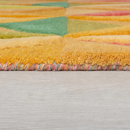 Edge detail of luma geometry hand tufted wool rug highlighting thick pile clean finish and quality craftsmanship.
