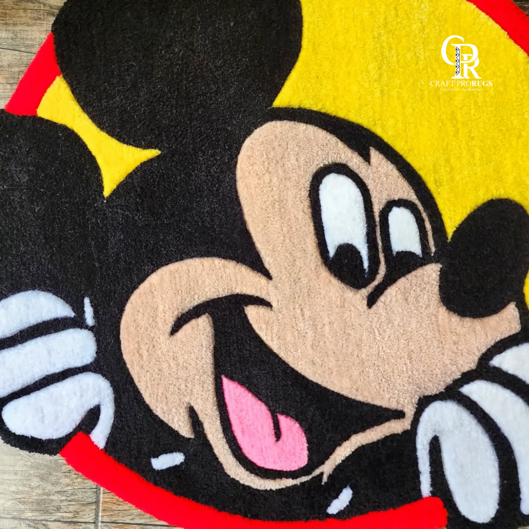 closeup of mickey inspired round hand tufted rug showing tufted texture