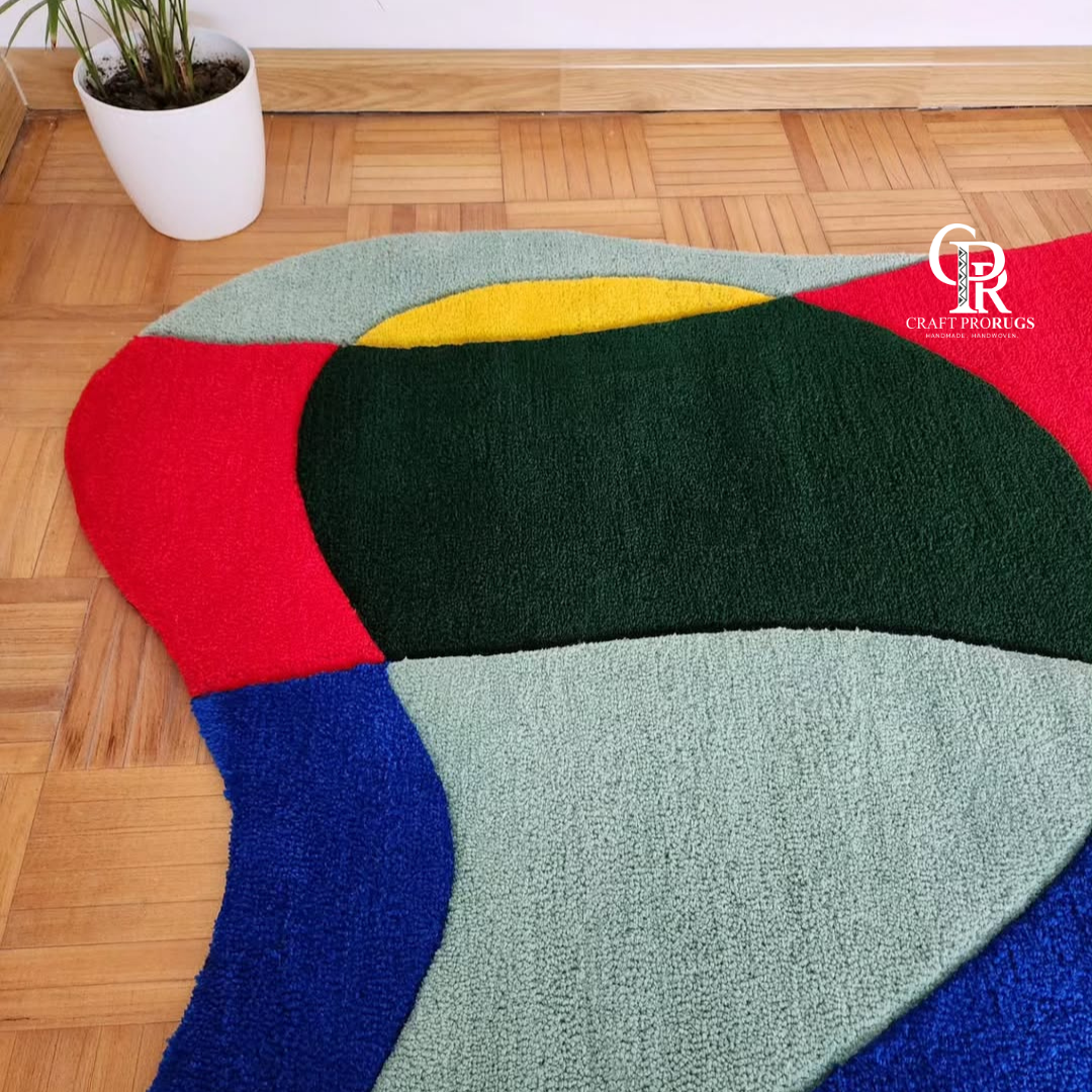 Multicolor abstract freeform hand‑tufted rug laid in living room  vibrant home décor