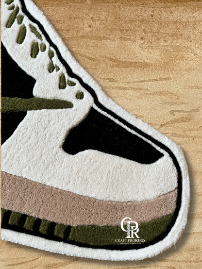 front view of hand-tufted Nike shoe shape rug front top of shoe showing