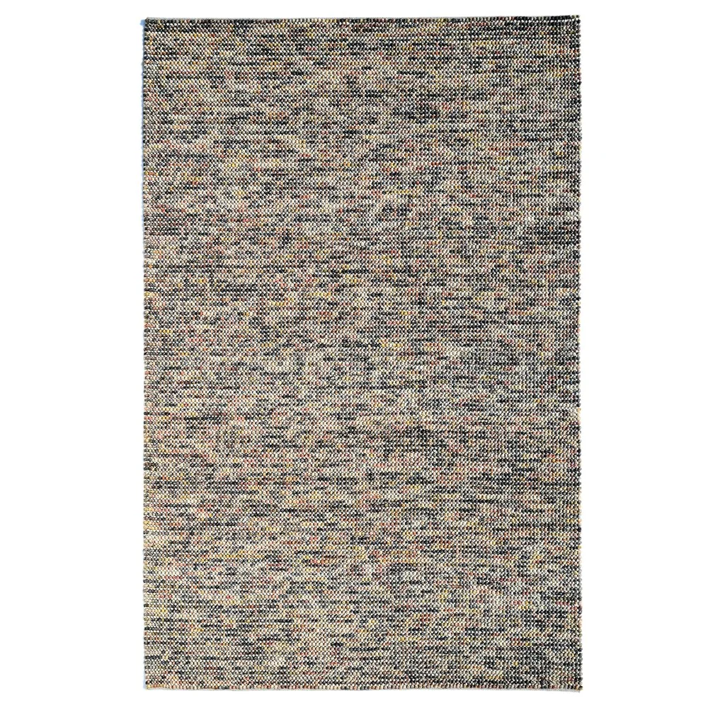 Top-angle view of Pebbles Magic Multi Grey flatweave rug showing full geometric pattern.