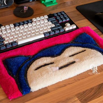 Hand‑tufted Snorlax keyboard rug front view