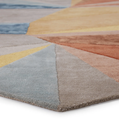 corner of stanford geometric rug highlighting hand-tufted craftsmanship and color details.