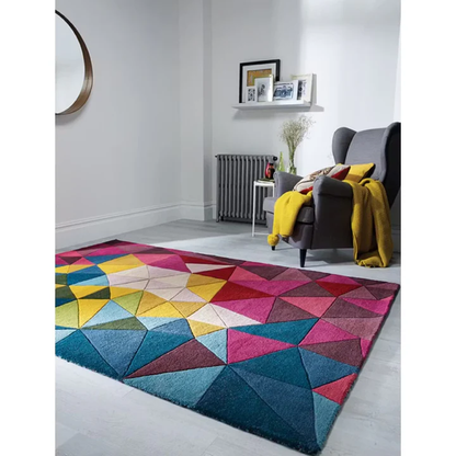 Hand tufted vivid geometry wool rug placed in a contemporary interior showing multicolor geometric pattern and clean edges