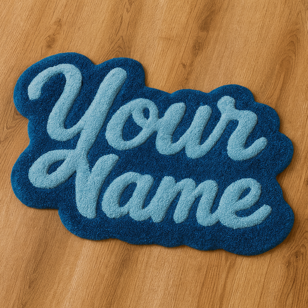 Blue hand-tufted rug with ‘Your Name’ text on a wooden floor