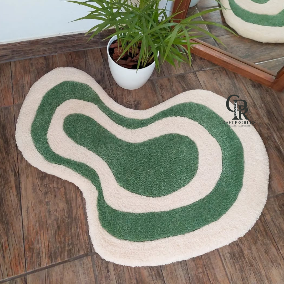 Zephyr Rug featuring modern curved green and cream pattern with soft organic shape