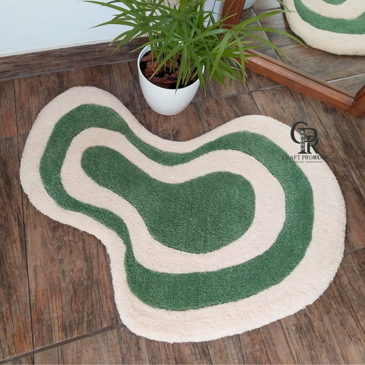 Zephyr Rug featuring modern curved green and cream pattern with soft organic shape