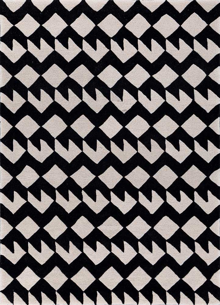 Full view of black and white zigzag monochrome wool rug, modern geometric design, hand-tufted.